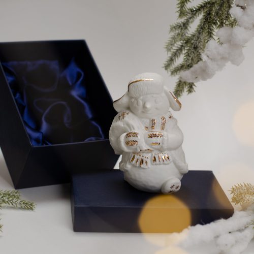 Фигурка Снеговик с мешком фарфор, золото с коробкой Фигурка Снеговик с мешком фарфор, золото с коробкой фото