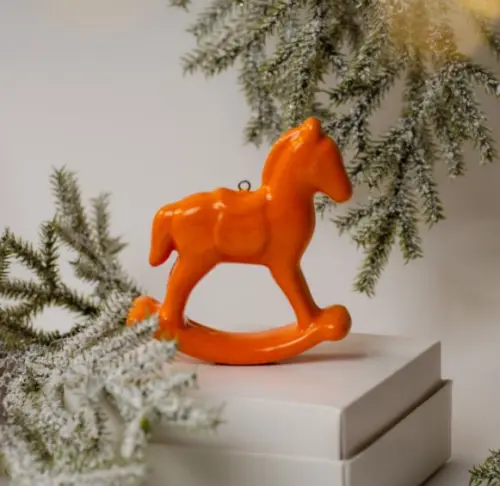 Лошадка качалка разноцветная глазурь оранжевые Лошадка качалка разноцветная глазурь оранжевые фото