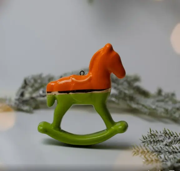 Лошадка качалка двухцветная с золотом ( желтая с оранжевым) Лошадка качалка двухцветная с золотом ( желтая с оранжевым) фото