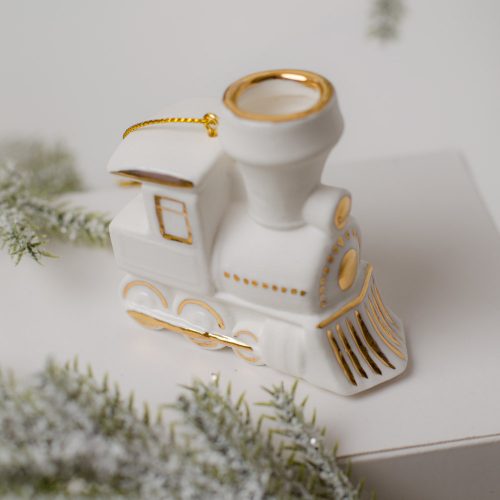 Паровозик фарфор, золото Размер: 6,1 × 3,0 × 6,0 см, вес: 44 гр. Паровозик фарфор, золото Размер: 6,1 × 3,0 × 6,0 см, вес: 44 гр. фото