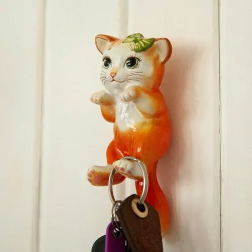 Кошка рыжая с бантиком (лапки и хвост-крючки) фото
