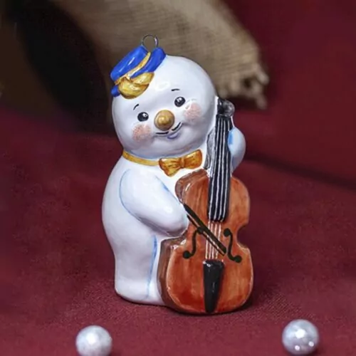 Снеговик-музыкант с контрабасом фото